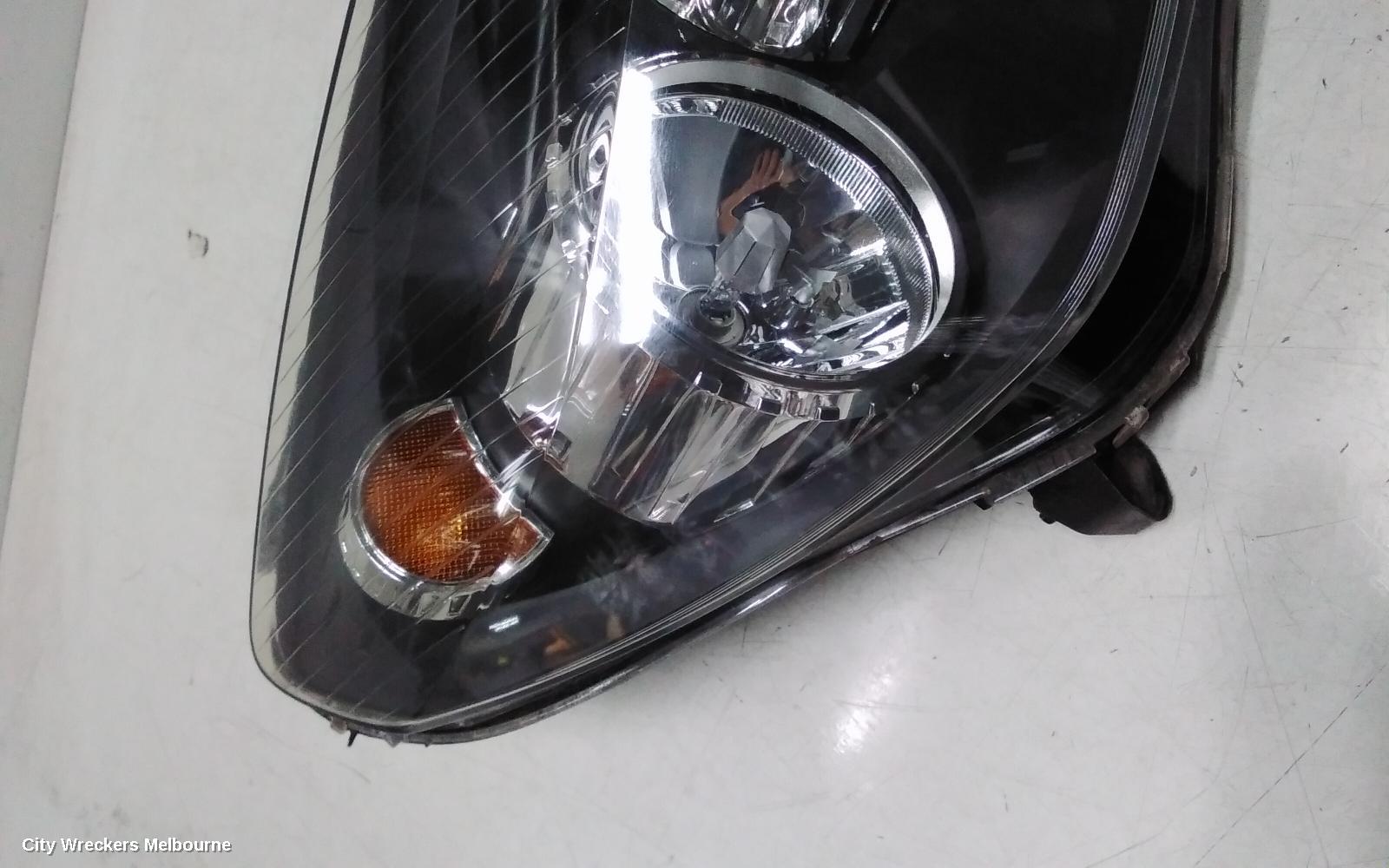 HOLDEN ASTRA RIGHT HEADLAMP, AH, BLACK INSERT TYPE, 10/2004 - 08/2009