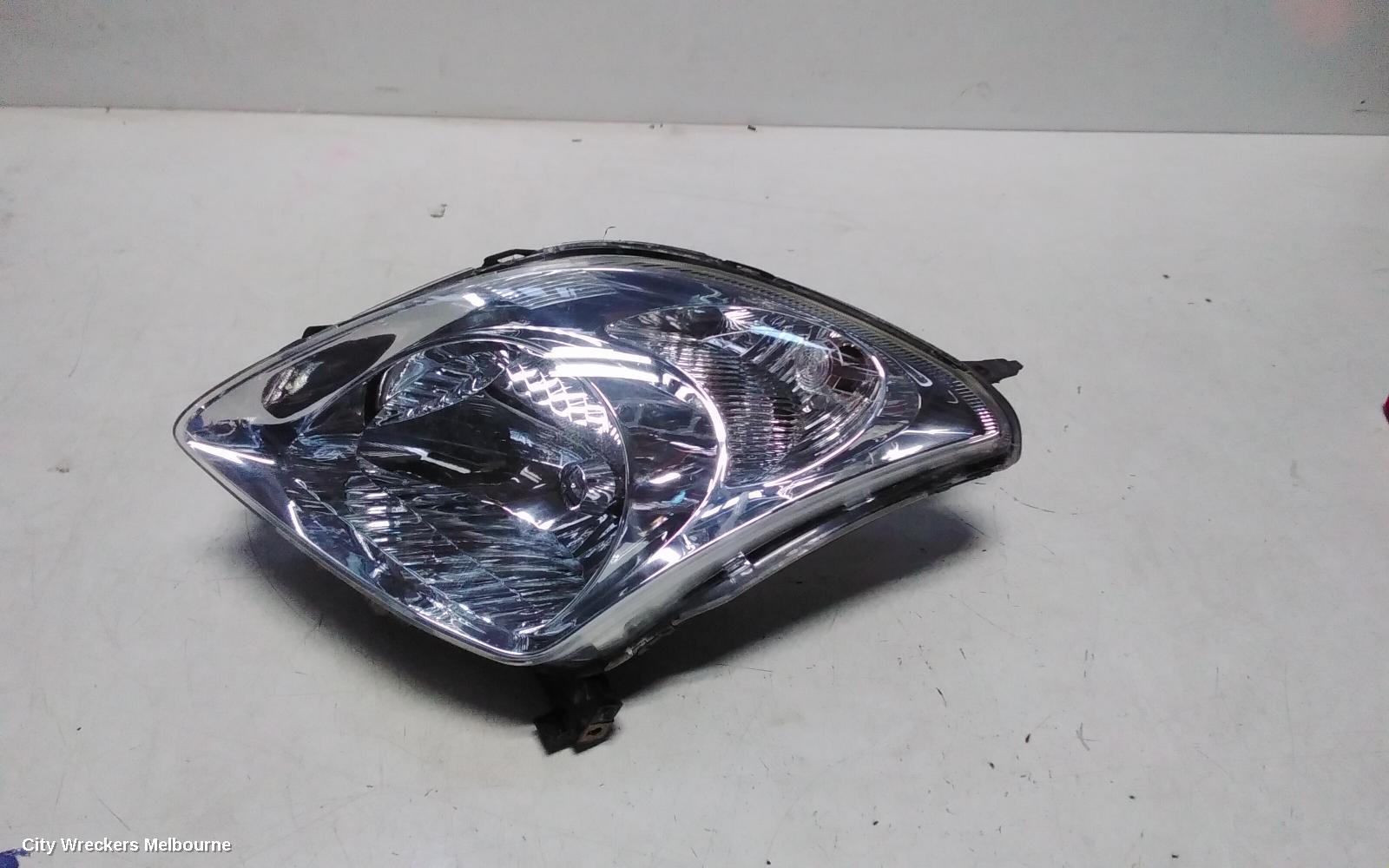 SUZUKI SWIFT LEFT HEADLAMP, RS415, MAN BEAM ADJUSTMENT, CHROME INSERT TYPE, 09/2004 - 02/2011