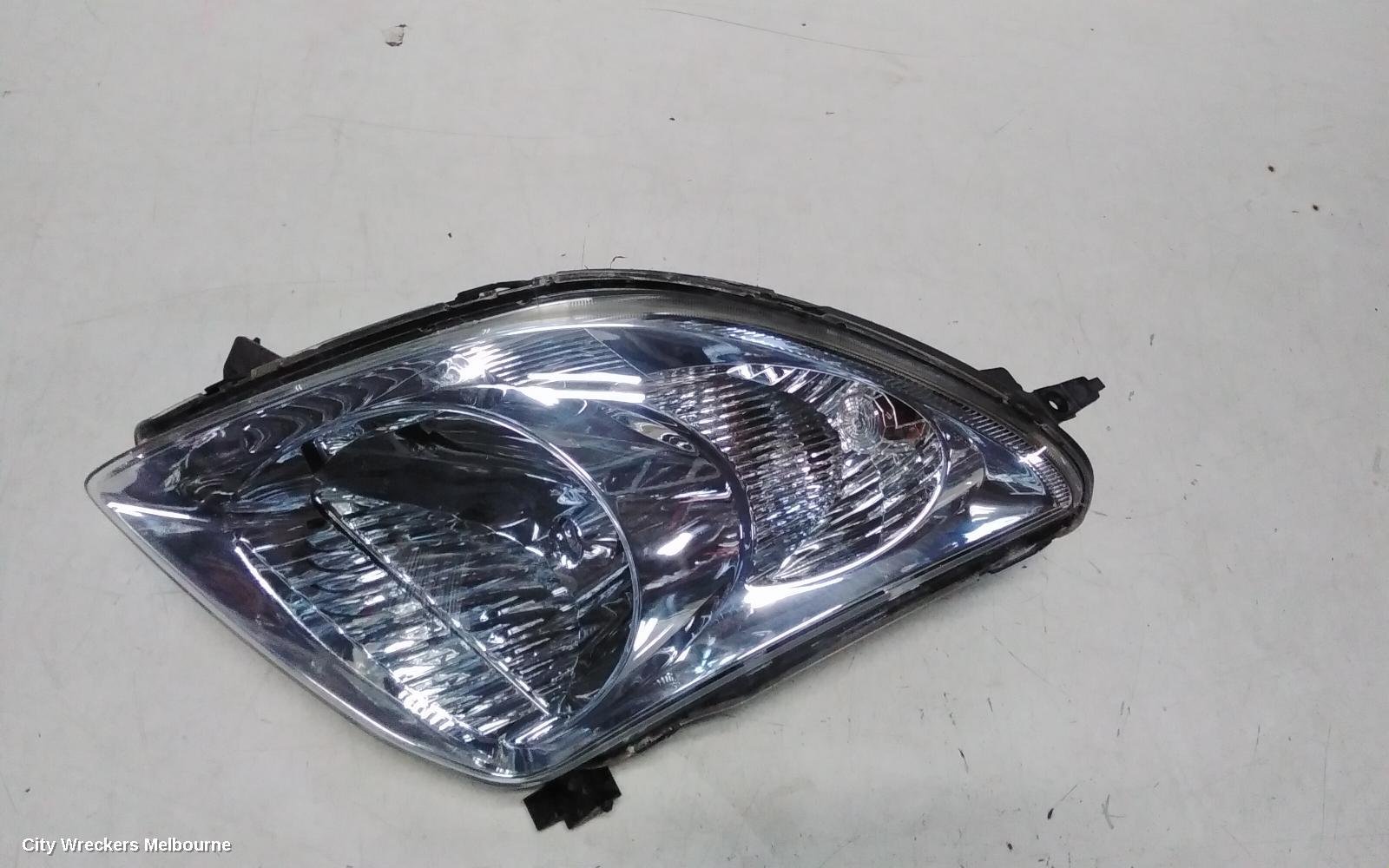 SUZUKI SWIFT LEFT HEADLAMP, RS415, MAN BEAM ADJUSTMENT, CHROME INSERT TYPE, 09/2004 - 02/2011