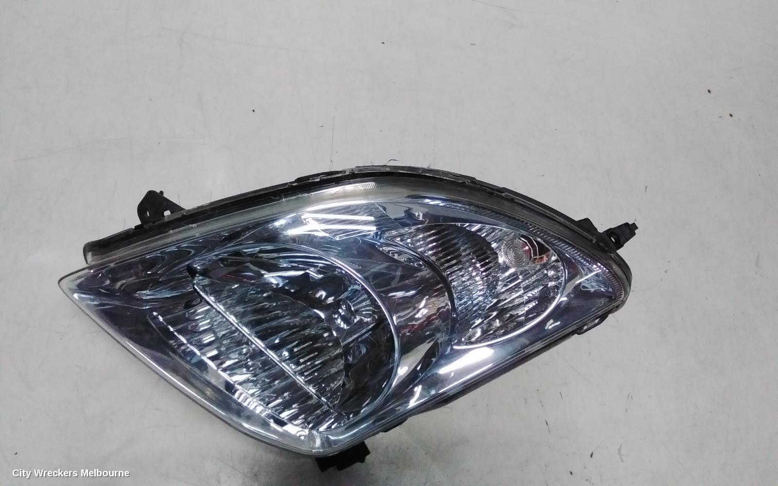 SUZUKI SWIFT LEFT HEADLAMP, RS415, MAN BEAM ADJUSTMENT, CHROME INSERT TYPE, 09/2004 - 02/2011