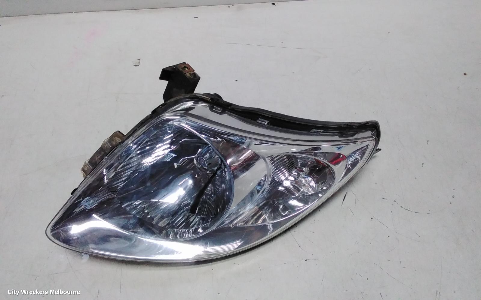 SUZUKI SWIFT RIGHT HEADLAMP, RS415, MAN BEAM ADJUSTMENT, CHROME INSERT TYPE, 09/2004 - 02/2011