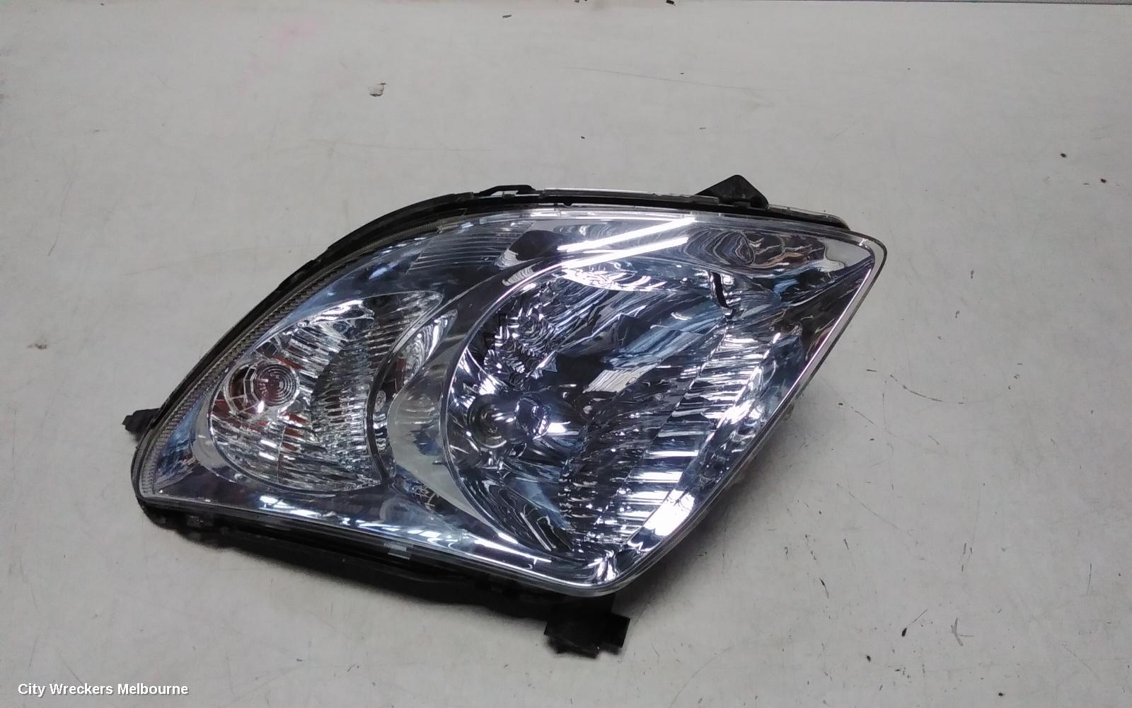 SUZUKI SWIFT RIGHT HEADLAMP, RS415, MAN BEAM ADJUSTMENT, CHROME INSERT TYPE, 09/2004 - 02/2011
