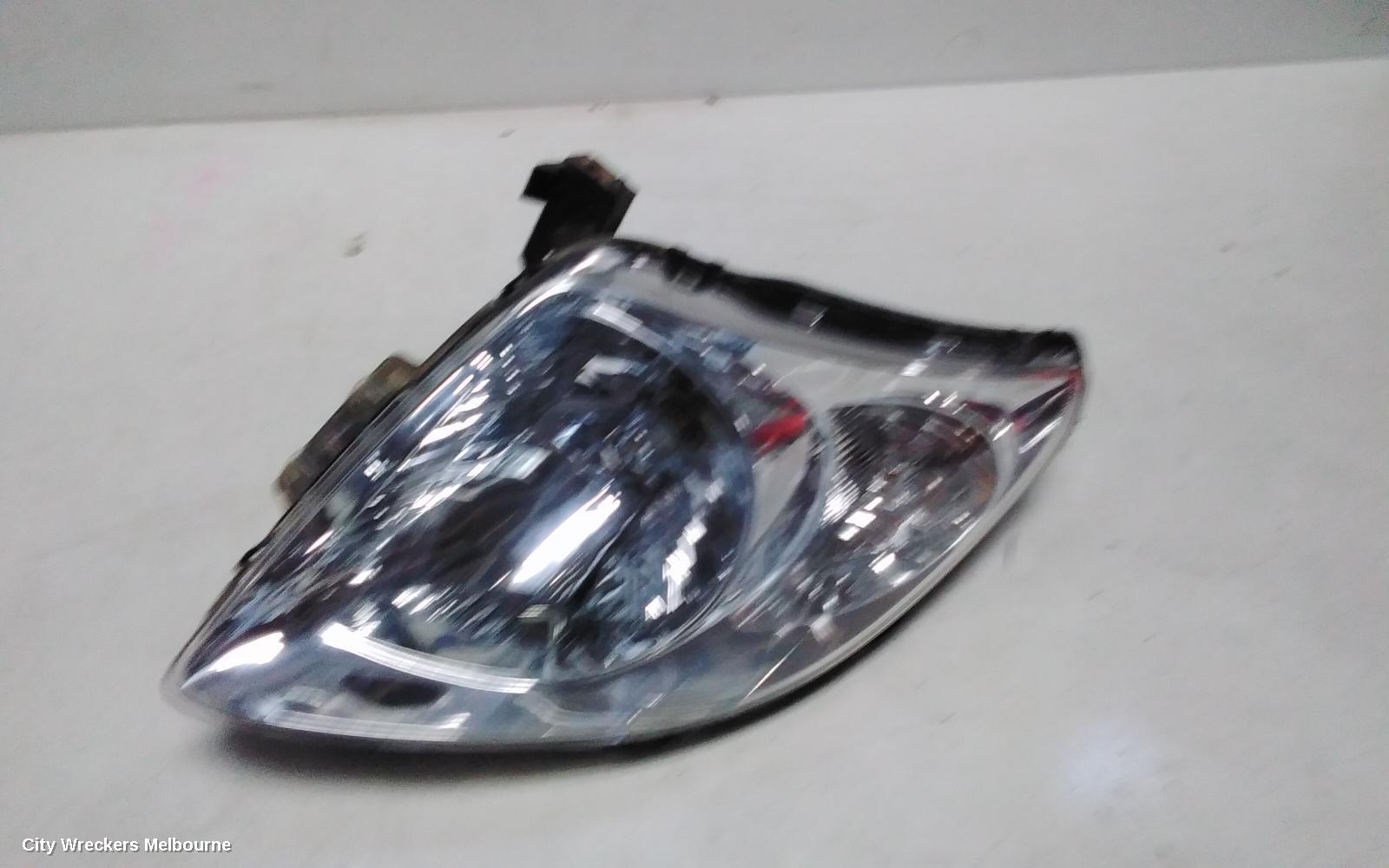 SUZUKI SWIFT RIGHT HEADLAMP, RS415, MAN BEAM ADJUSTMENT, CHROME INSERT TYPE, 09/2004 - 02/2011