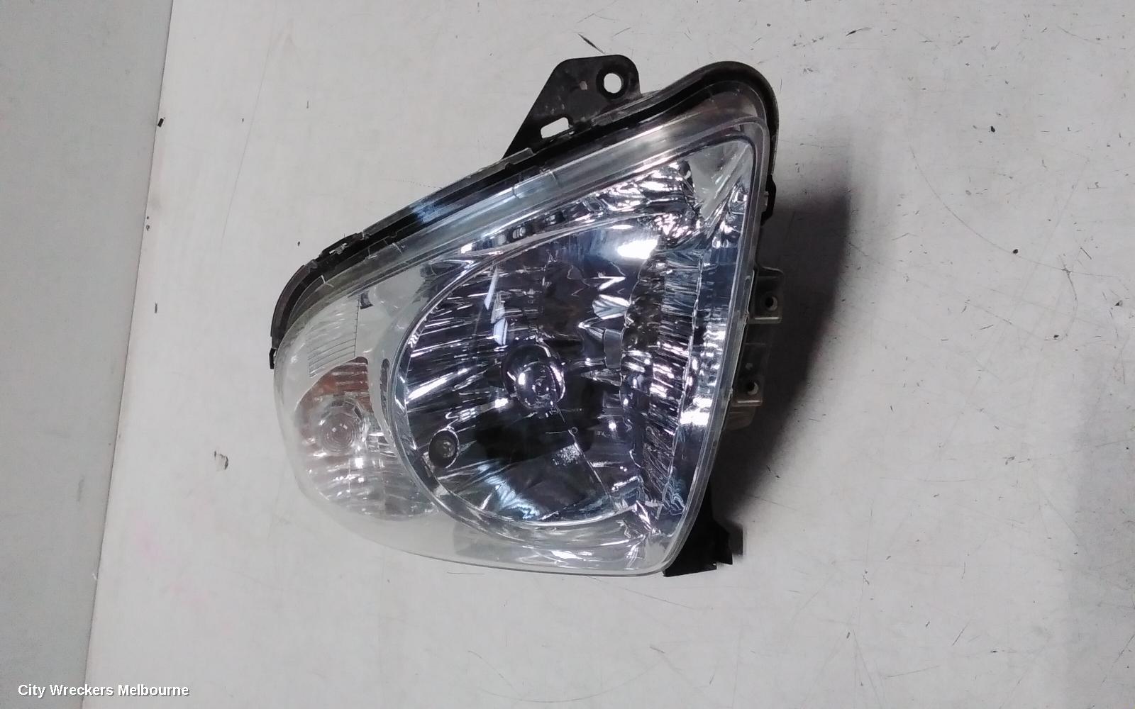 SUZUKI SWIFT RIGHT HEADLAMP, RS415, MAN BEAM ADJUSTMENT, CHROME INSERT TYPE, 09/2004 - 02/2011