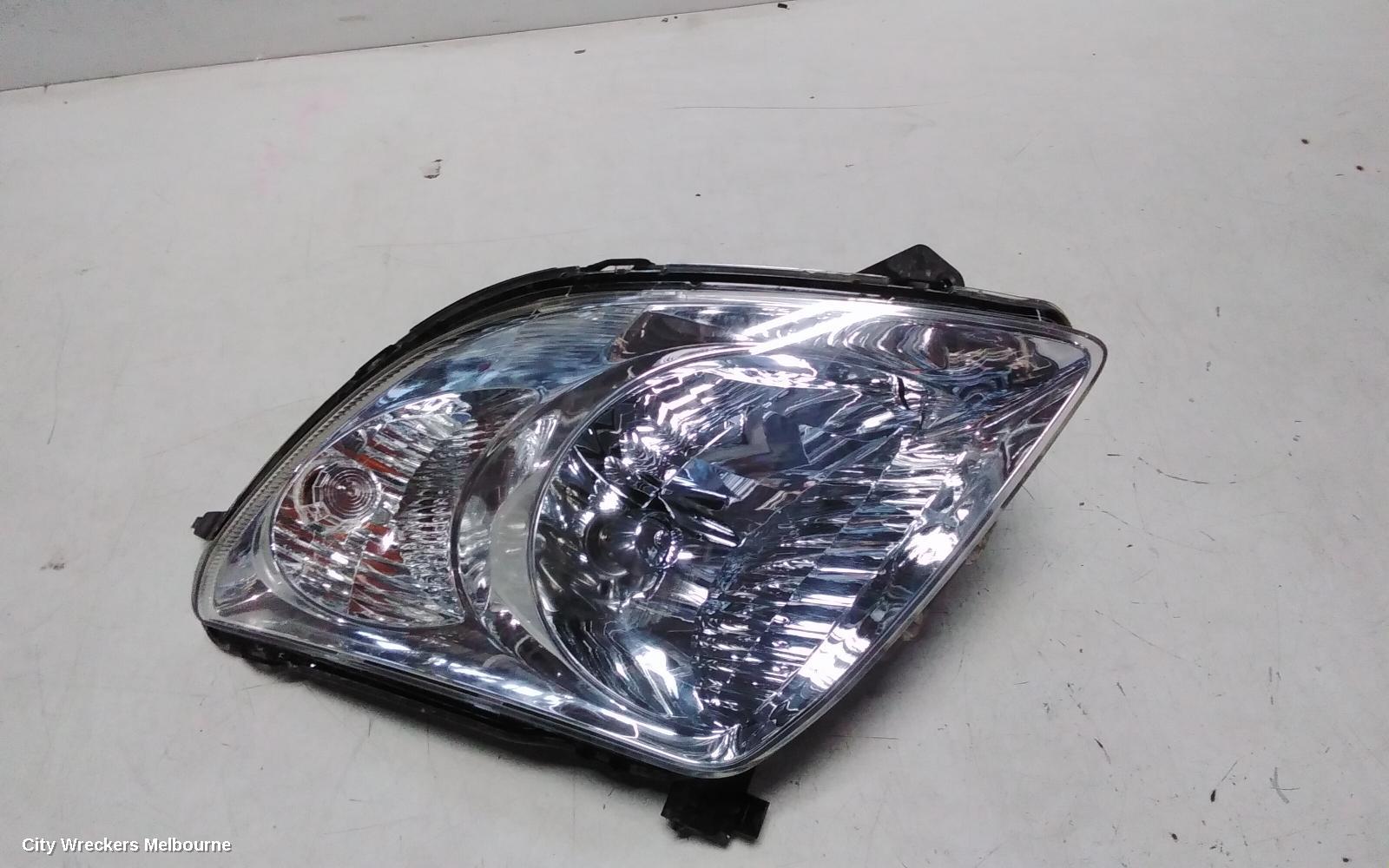 SUZUKI SWIFT RIGHT HEADLAMP, RS415, MAN BEAM ADJUSTMENT, CHROME INSERT TYPE, 09/2004 - 02/2011