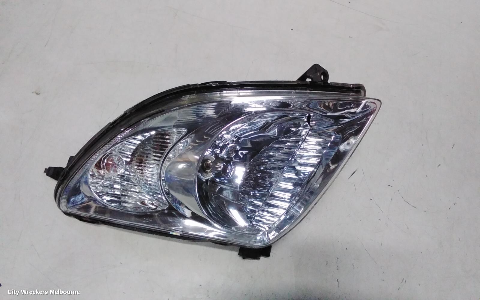 SUZUKI SWIFT RIGHT HEADLAMP, RS415, MAN BEAM ADJUSTMENT, CHROME INSERT TYPE, 09/2004 - 02/2011