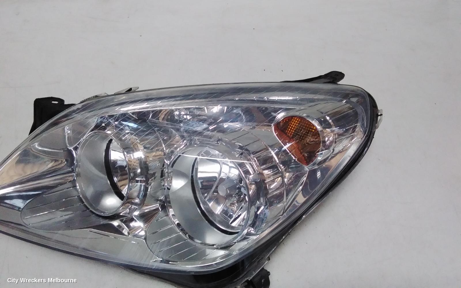 HOLDEN ASTRA LEFT HEADLAMP, AH, CHROME INSERT TYPE, 10/2006 - 08/2009