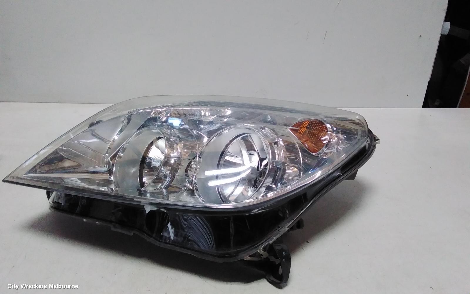 HOLDEN ASTRA LEFT HEADLAMP, AH, CHROME INSERT TYPE, 10/2006 - 08/2009