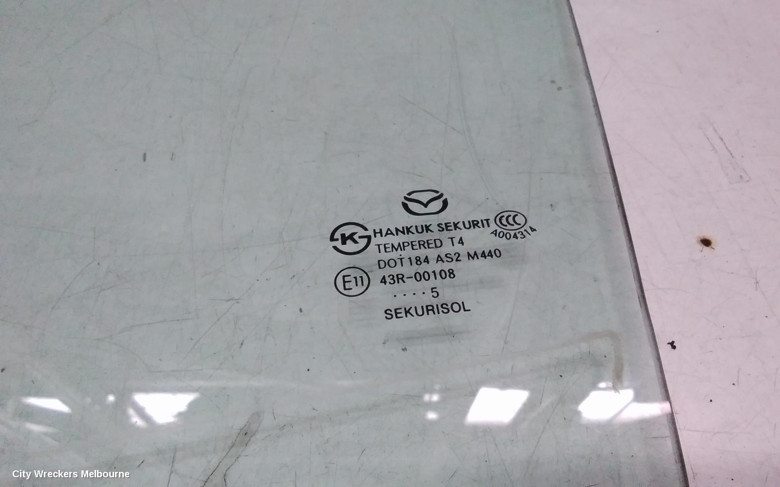 MAZDA 3 LEFT REAR DOOR WINDOW, BM-BN, STANDARD TINT TYPE, 06/2013 - 02/2019