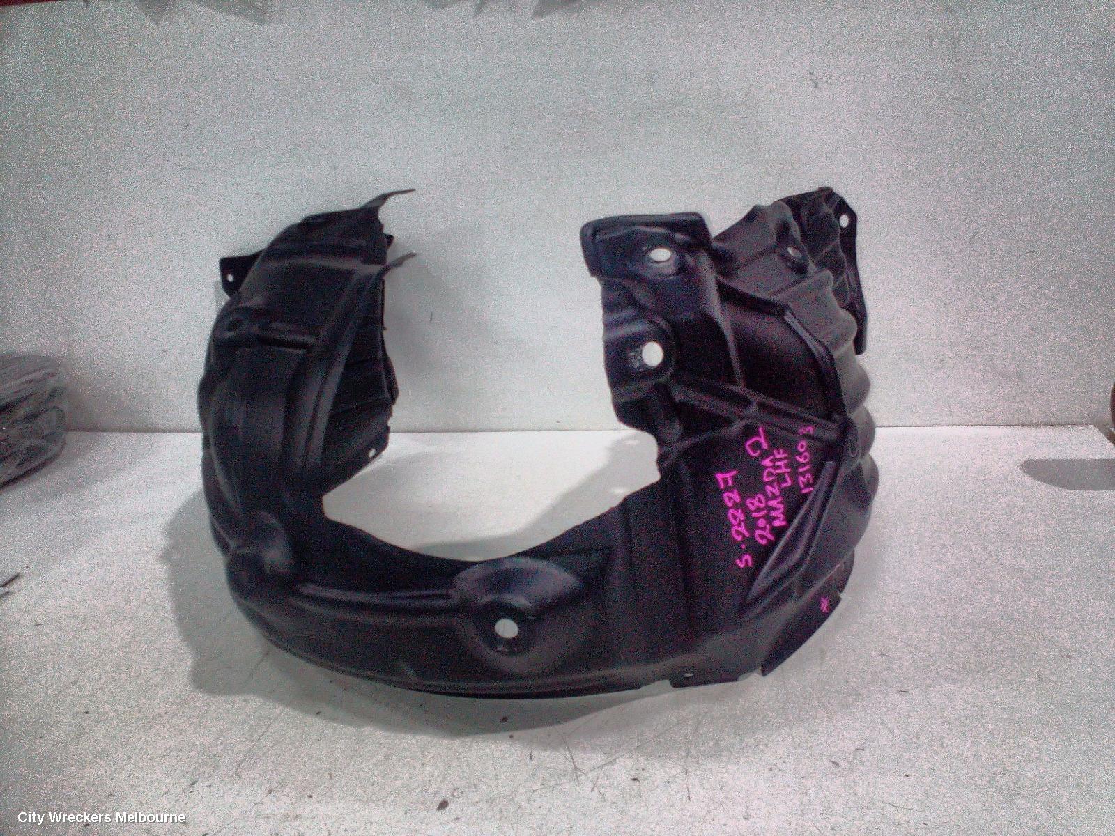 MAZDA 2 LEFT GUARD LINER, DJ/DL, FRONT, 09/2014 ONWARDS