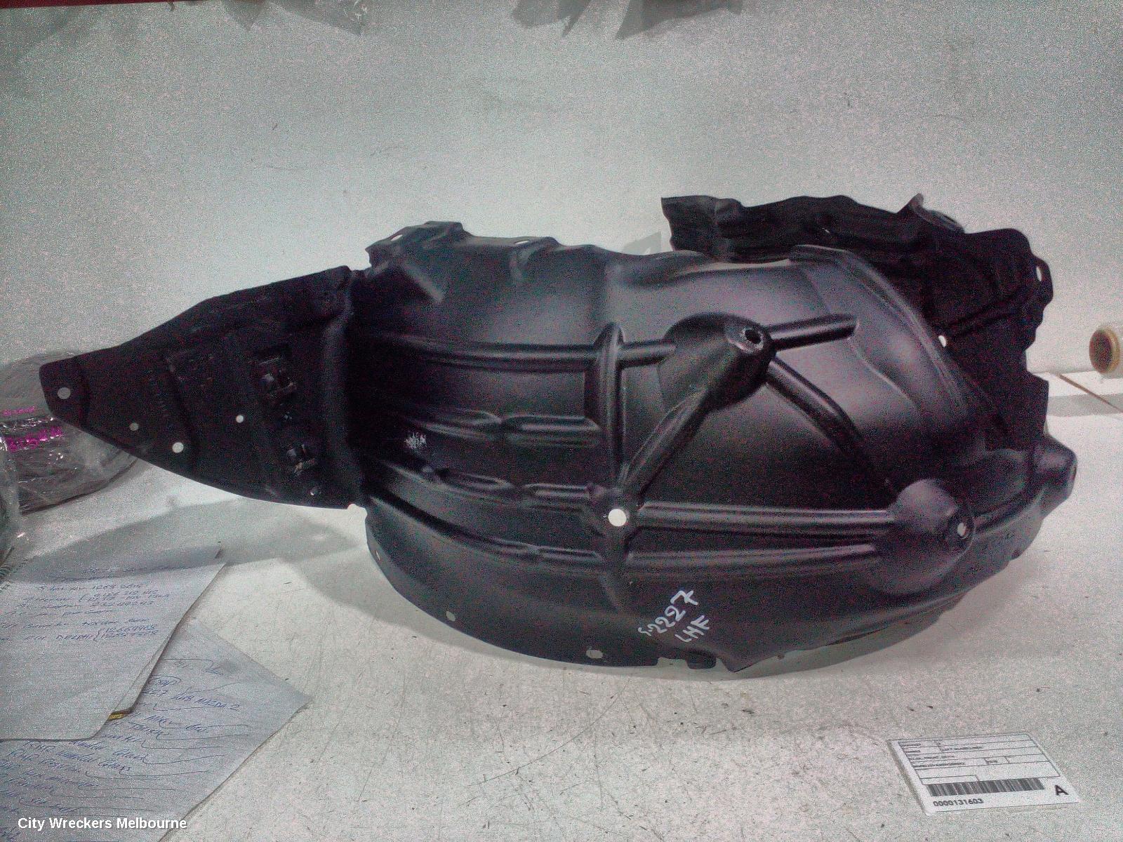 MAZDA 2 LEFT GUARD LINER, DJ/DL, FRONT, 09/2014 ONWARDS