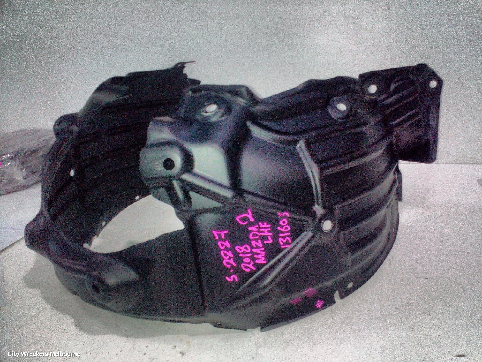 MAZDA 2 LEFT GUARD LINER, DJ/DL, FRONT, 09/2014 ONWARDS