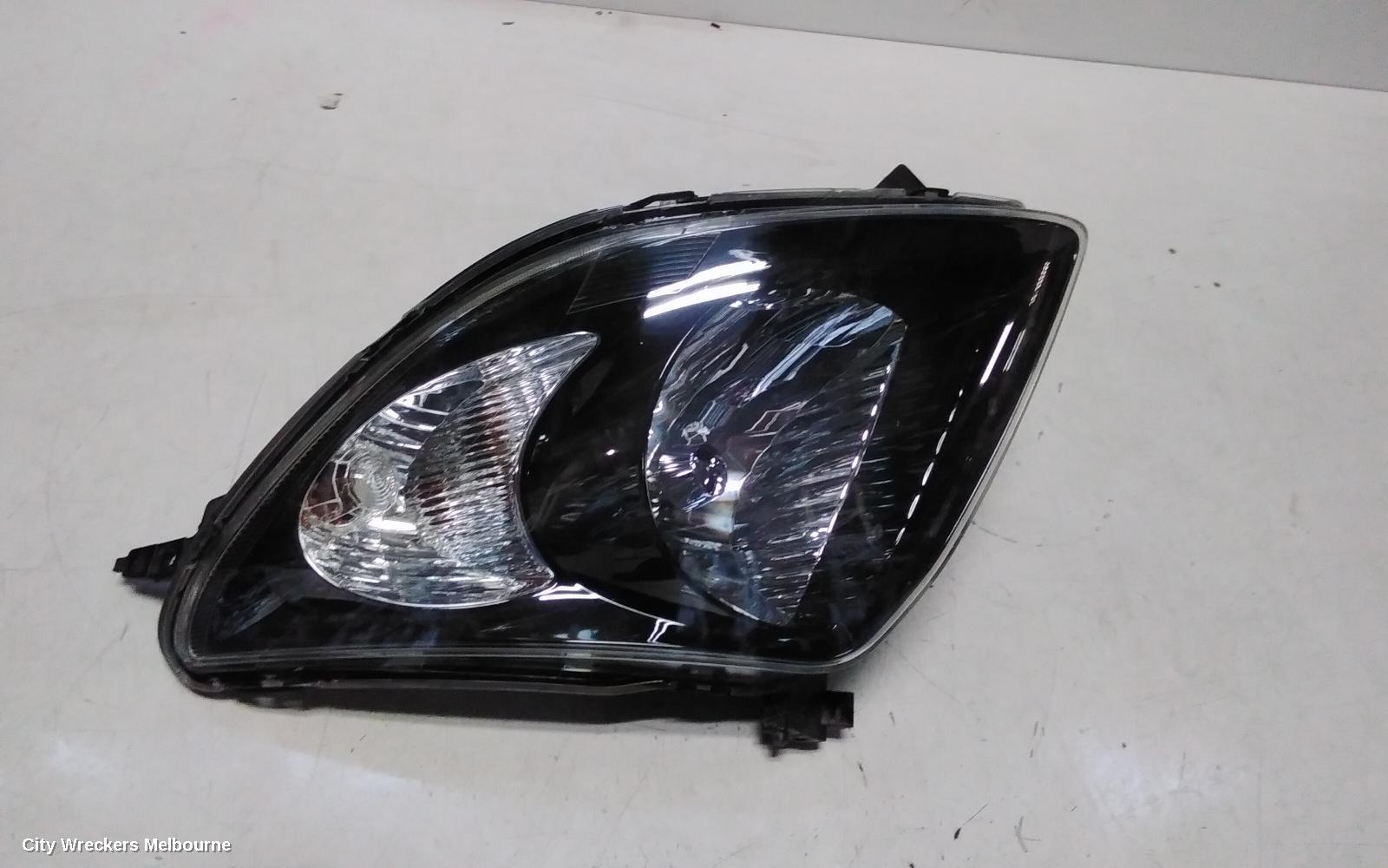 SUZUKI SWIFT RIGHT HEADLAMP, RS415, MAN BEAM ADJUSTMENT, BLACK INSERT TYPE, 09/2004 - 02/2011