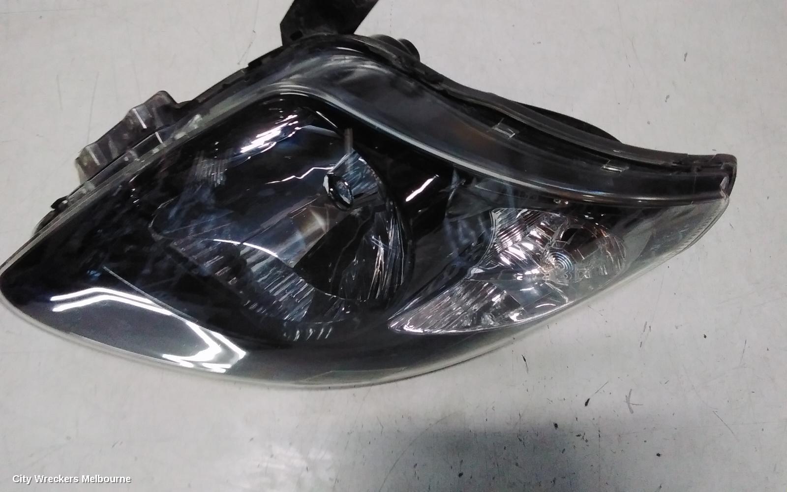 SUZUKI SWIFT RIGHT HEADLAMP, RS415, MAN BEAM ADJUSTMENT, BLACK INSERT TYPE, 09/2004 - 02/2011