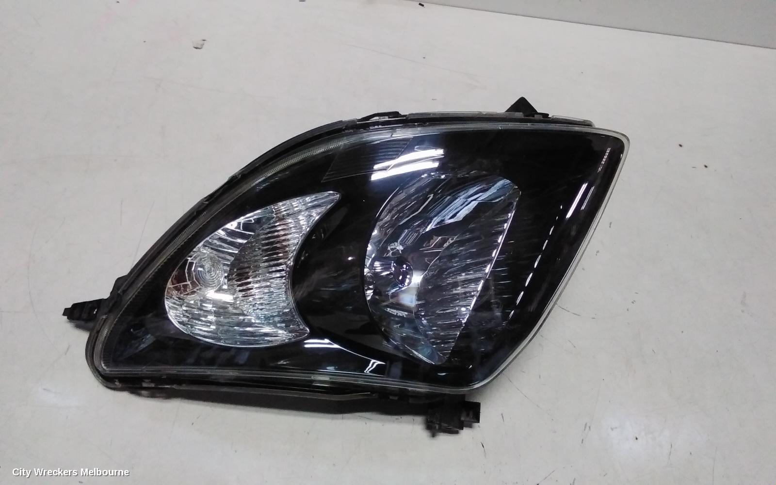 SUZUKI SWIFT RIGHT HEADLAMP, RS415, MAN BEAM ADJUSTMENT, BLACK INSERT TYPE, 09/2004 - 02/2011