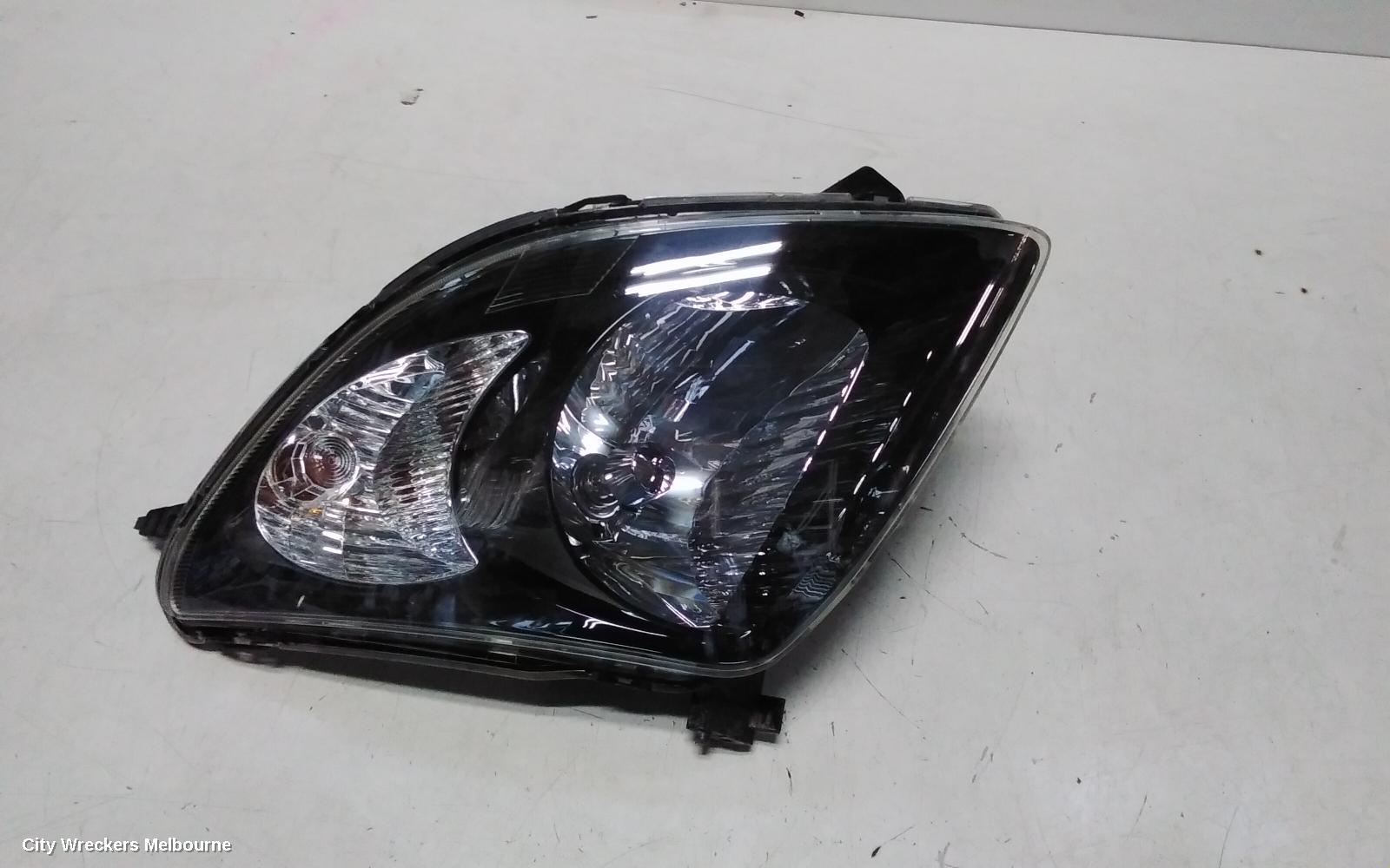 SUZUKI SWIFT RIGHT HEADLAMP, RS415, MAN BEAM ADJUSTMENT, BLACK INSERT TYPE, 09/2004 - 02/2011