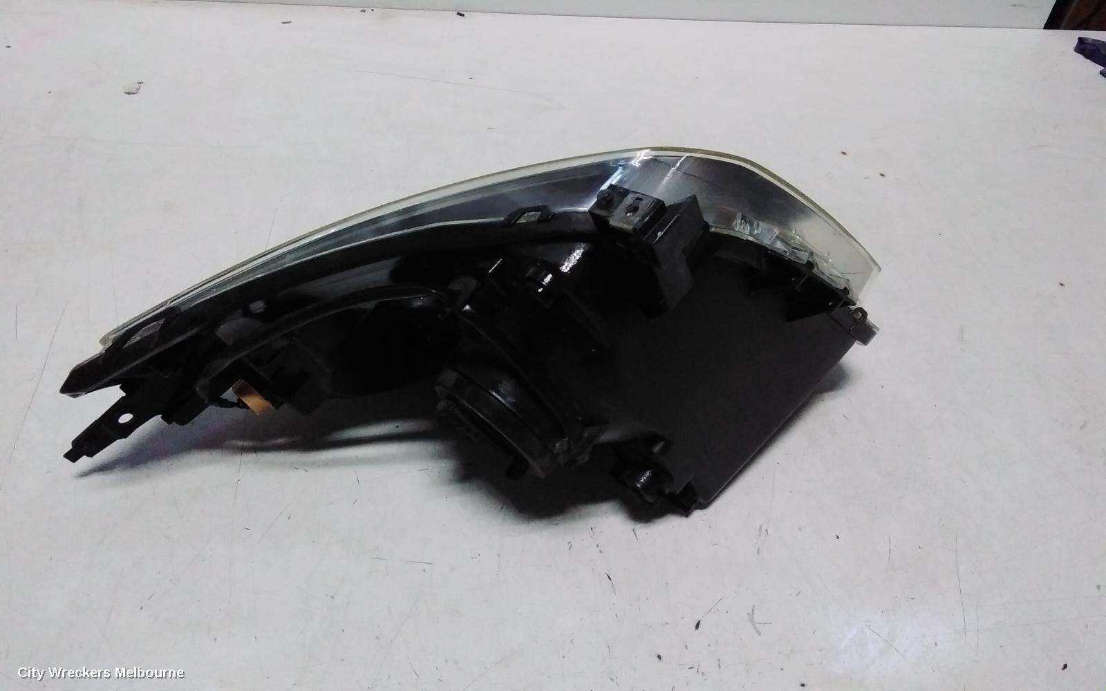 SUZUKI SWIFT RIGHT HEADLAMP, RS415, MAN BEAM ADJUSTMENT, BLACK INSERT TYPE, 09/2004 - 02/2011