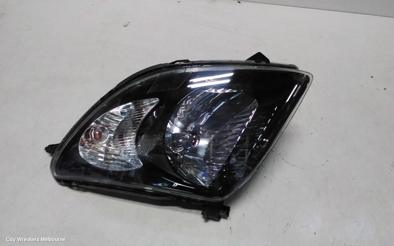 SUZUKI SWIFT RIGHT HEADLAMP, RS415, MAN BEAM ADJUSTMENT, BLACK INSERT TYPE, 09/2004 - 02/2011