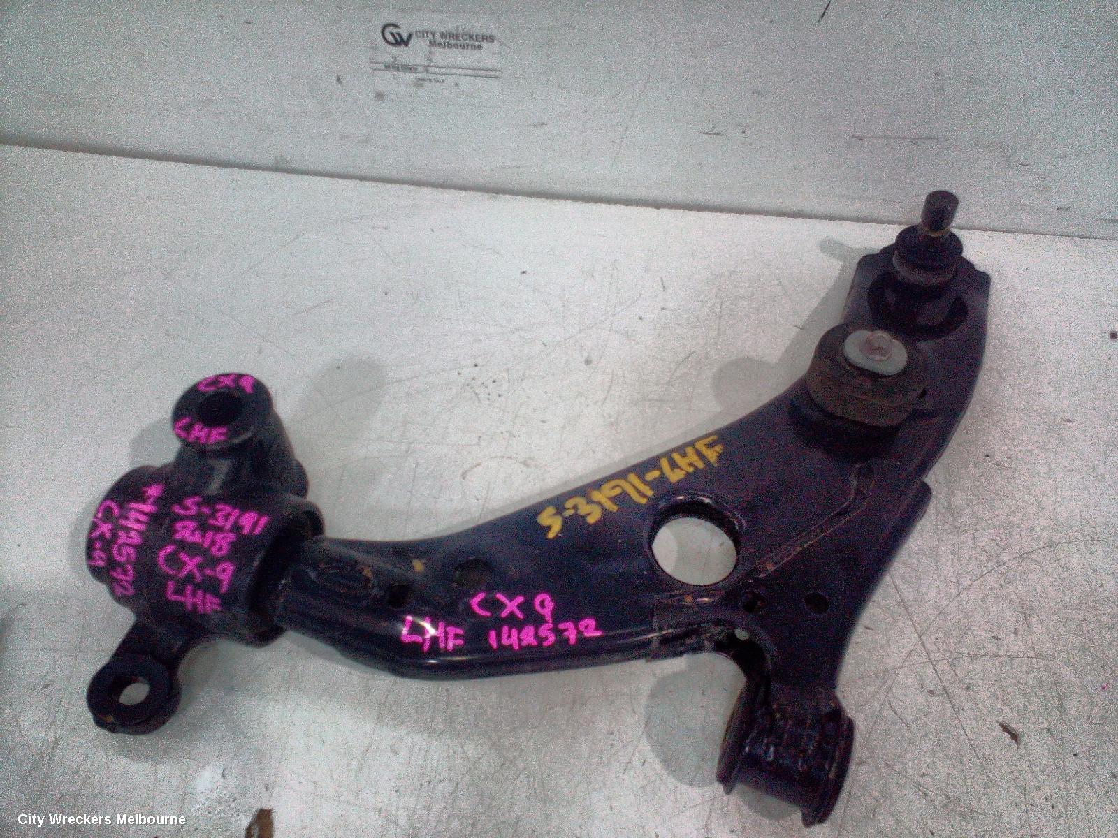 MAZDA CX9 LEFT FRONT LOWER CONTROL ARM, TC, 07/2016 - 12/2024