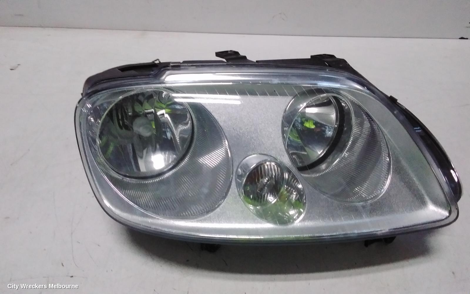 VOLKSWAGEN CADDY RIGHT HEADLAMP, 2K, CHROME INSERT TYPE, 12/2004 - 08/2010