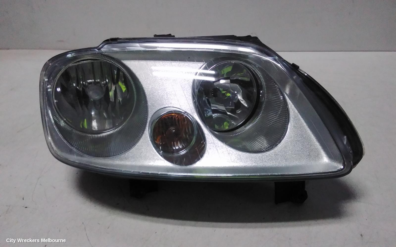VOLKSWAGEN CADDY RIGHT HEADLAMP, 2K, CHROME INSERT TYPE, 12/2004 - 08/2010