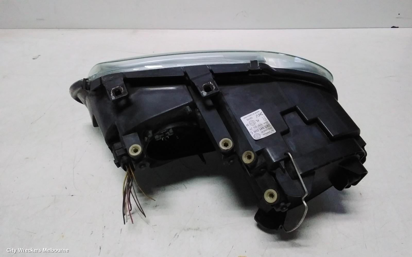 VOLKSWAGEN CADDY RIGHT HEADLAMP, 2K, CHROME INSERT TYPE, 12/2004 - 08/2010