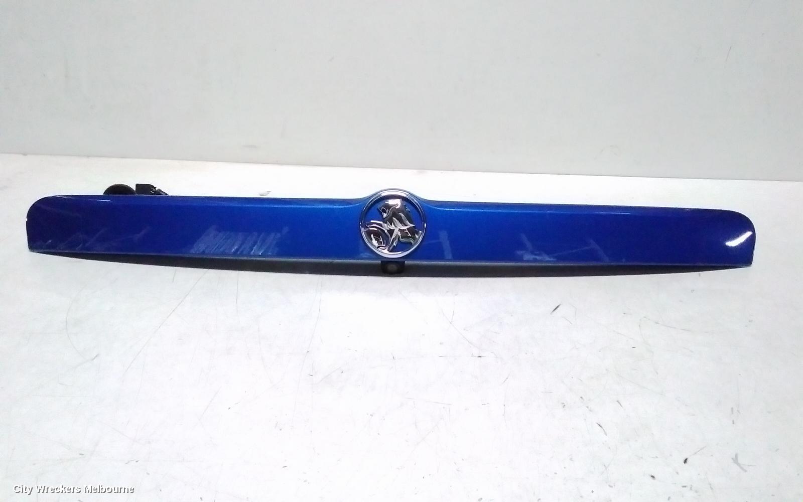 HOLDEN TRAX REAR GARNISH, TAILGATE GARNISH, W/ REVERSE CAMERA TYPE, TJ SERIES, 08/2013 - 12/2020