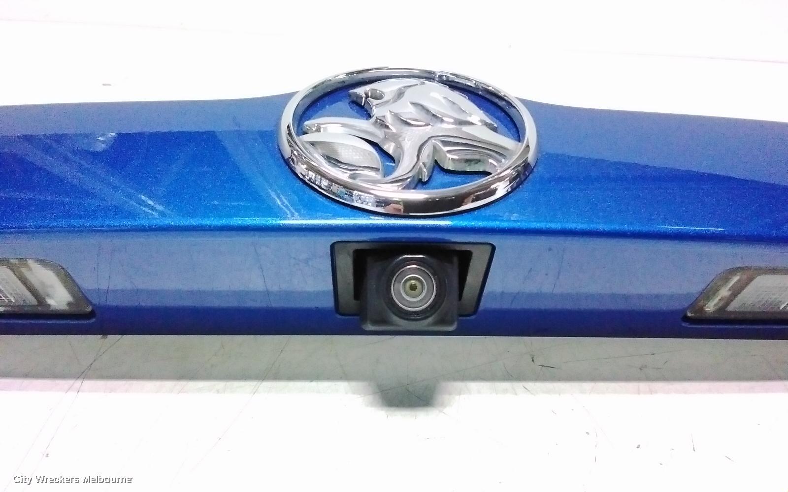 HOLDEN TRAX REAR GARNISH, TAILGATE GARNISH, W/ REVERSE CAMERA TYPE, TJ SERIES, 08/2013 - 12/2020