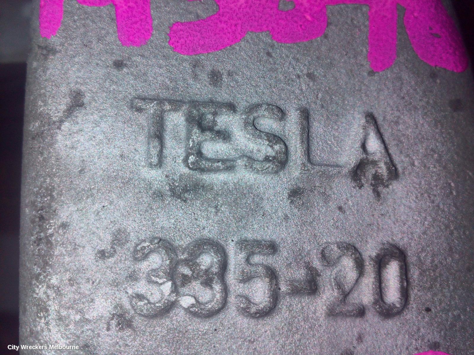 TESLA MODEL Y CALIPER, 1ST GEN, LH REAR, 1 PISTON TYPE, STANDARD, 03/2022 - 02/2025