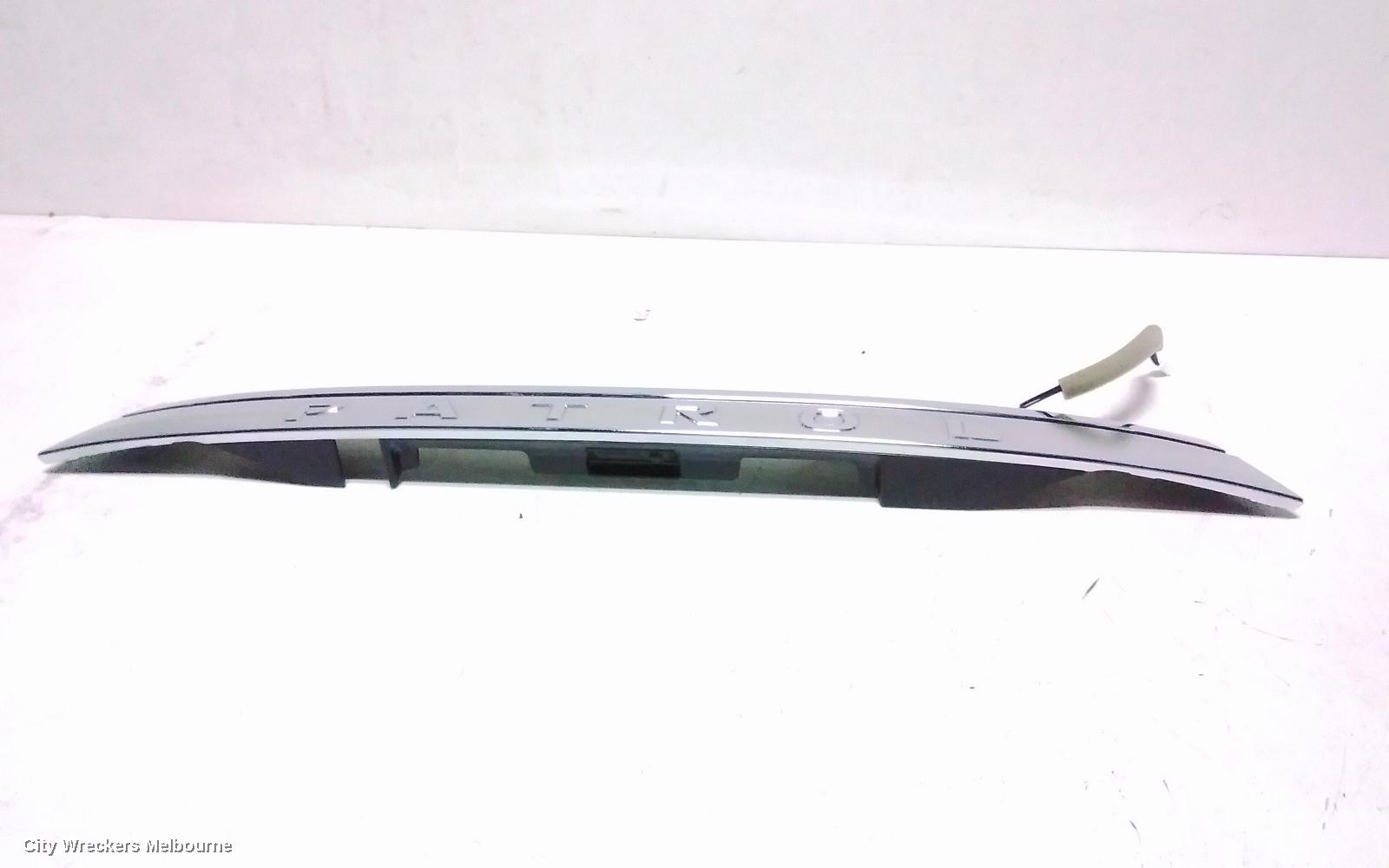 NISSAN PATROL REAR GARNISH, Y62, TAILGATE GARNISH (CENTRE), 10/2019 ONWARDS
