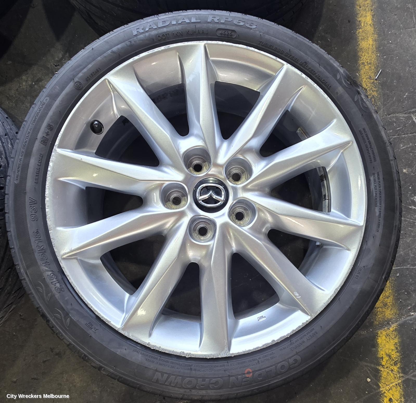 MAZDA 3 WHEEL MAG, FACTORY, 18X7IN, LIGHT GREY, BN, 05/2016 - 02/2019