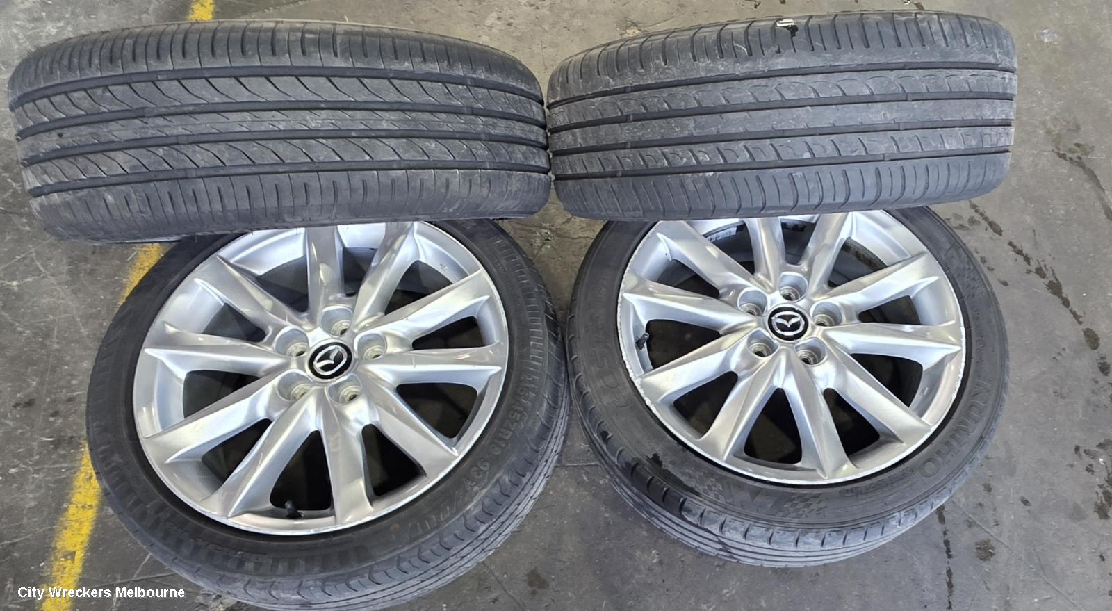 MAZDA 3 WHEEL MAG, FACTORY, 18X7IN, LIGHT GREY, BN, 05/2016 - 02/2019