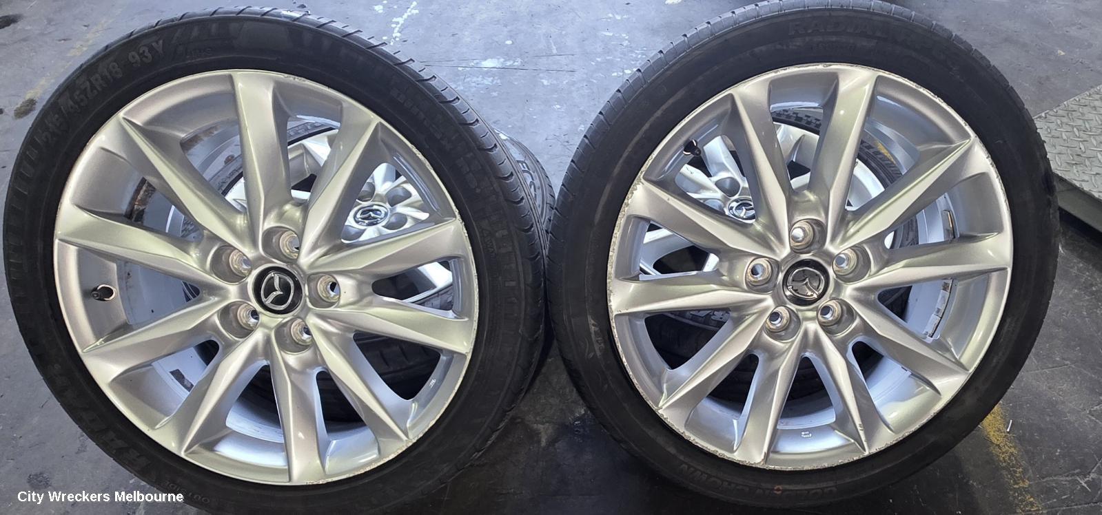MAZDA 3 WHEEL MAG, FACTORY, 18X7IN, LIGHT GREY, BN, 05/2016 - 02/2019