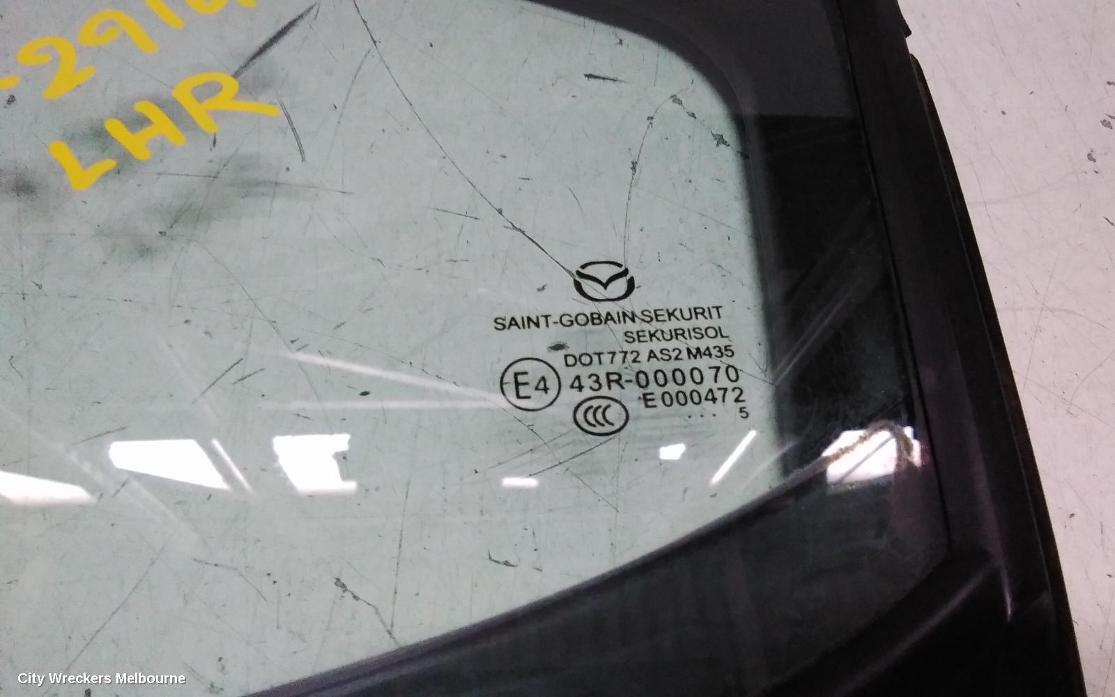 MAZDA 3 LEFT REAR 1/4 DOOR GLASS, BM-BN, STANDARD TINT TYPE, 06/2013 - 02/2019