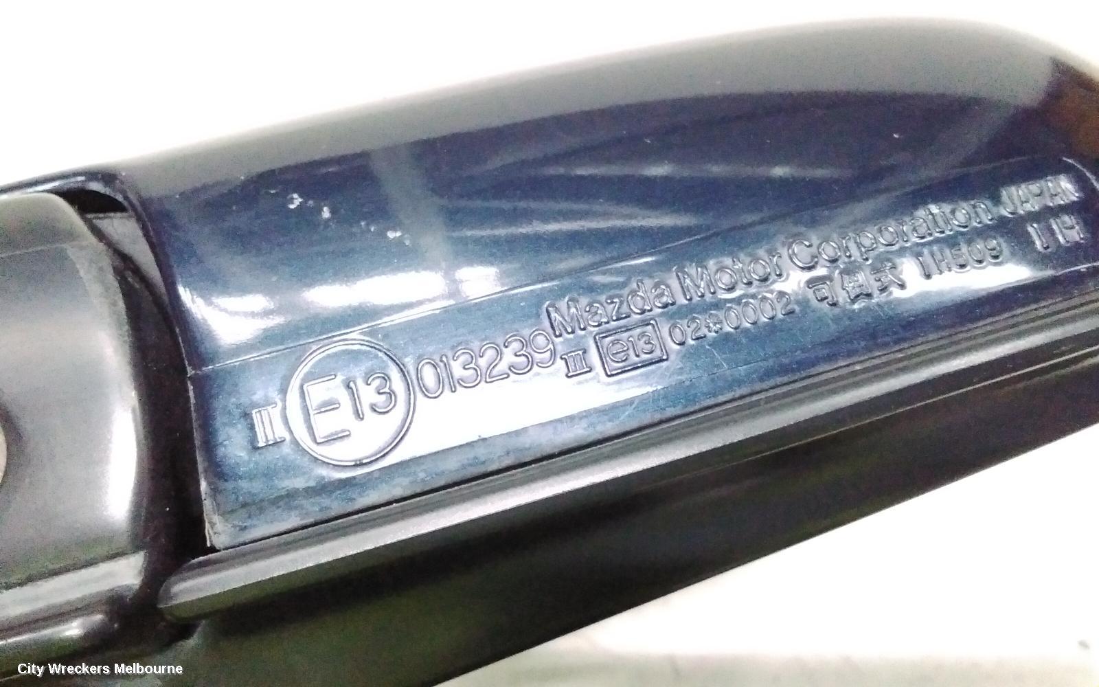 MAZDA 323 LEFT DOOR MIRROR, BA11 POWER-SMOOTH CASE 07/1994 - 11/1996