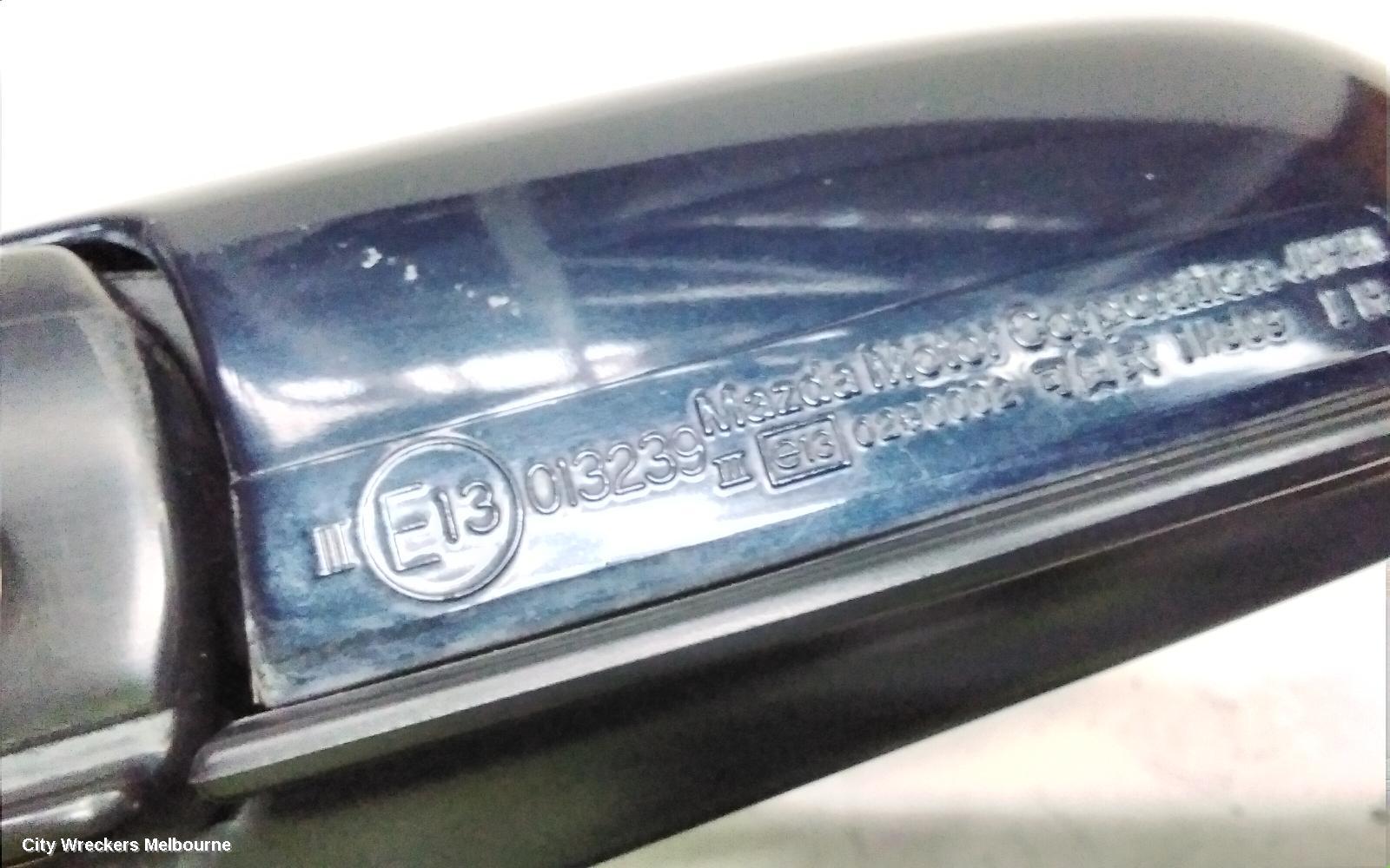 MAZDA 323 LEFT DOOR MIRROR, BA11 POWER-SMOOTH CASE 07/1994 - 11/1996