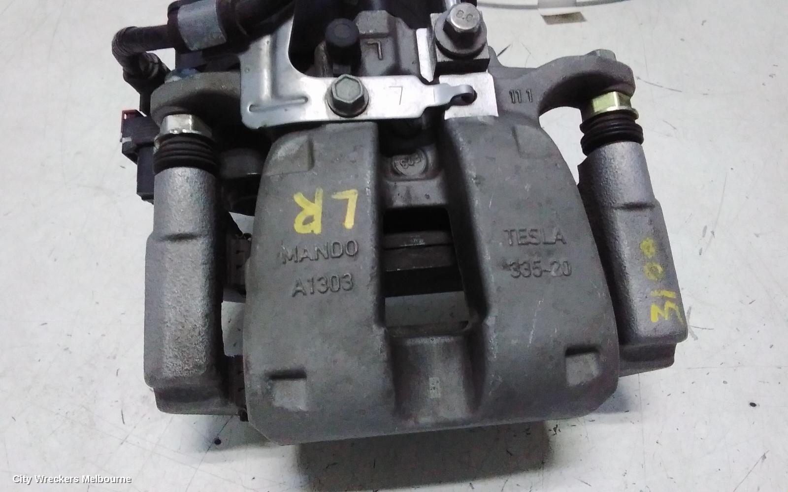 TESLA MODEL Y CALIPER, 1ST GEN, LH REAR, 1 PISTON TYPE, NON PERFORMANCE, 03/2022 - 02/2025