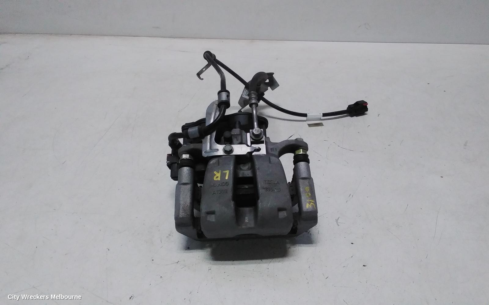 TESLA MODEL Y CALIPER, 1ST GEN, LH REAR, 1 PISTON TYPE, NON PERFORMANCE, 03/2022 - 02/2025