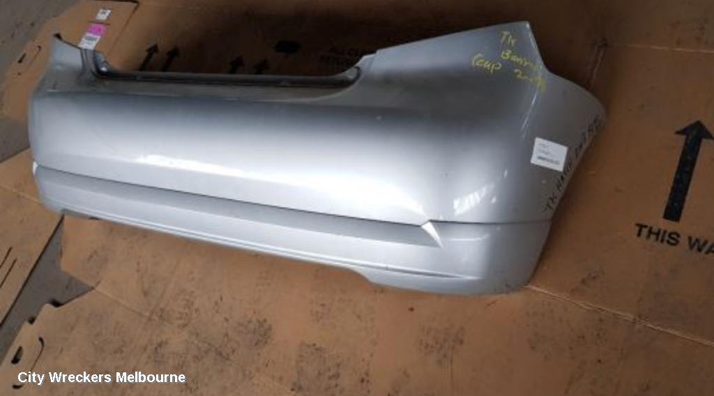 HOLDEN BARINA REAR BUMPER, BUMPER BAR (COMPLETE), TK, 3DR HATCH, 12/2005 - 06/2008