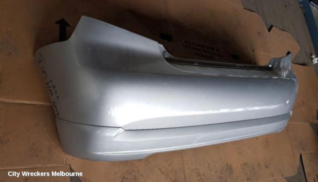 HOLDEN BARINA REAR BUMPER, BUMPER BAR (COMPLETE), TK, 3DR HATCH, 12/2005 - 06/2008