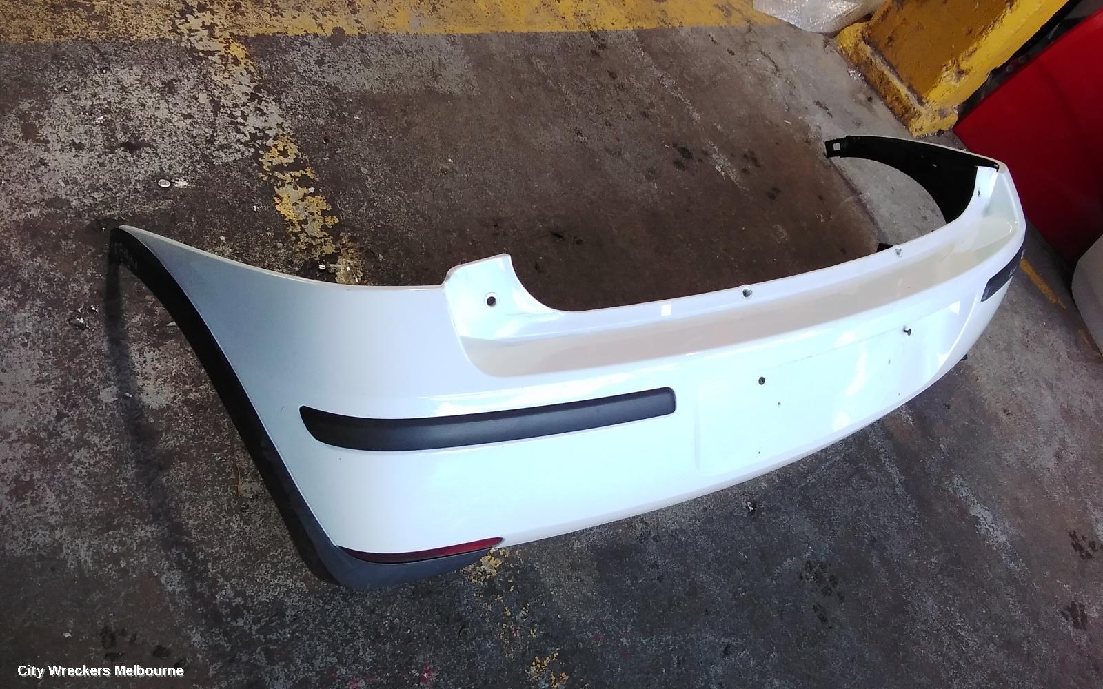 HOLDEN BARINA REAR BUMPER, BUMPER BAR, HATCH, LAST 8 DIGITS OF VIN IS FROM  44000001-, (REFLECTORS ON BOTTOM), XC, 03/2001 - 11/2005