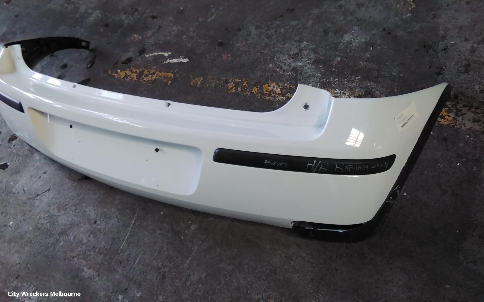 HOLDEN BARINA REAR BUMPER, BUMPER BAR, HATCH, LAST 8 DIGITS OF VIN IS FROM  44000001-, (REFLECTORS ON BOTTOM), XC, 03/2001 - 11/2005