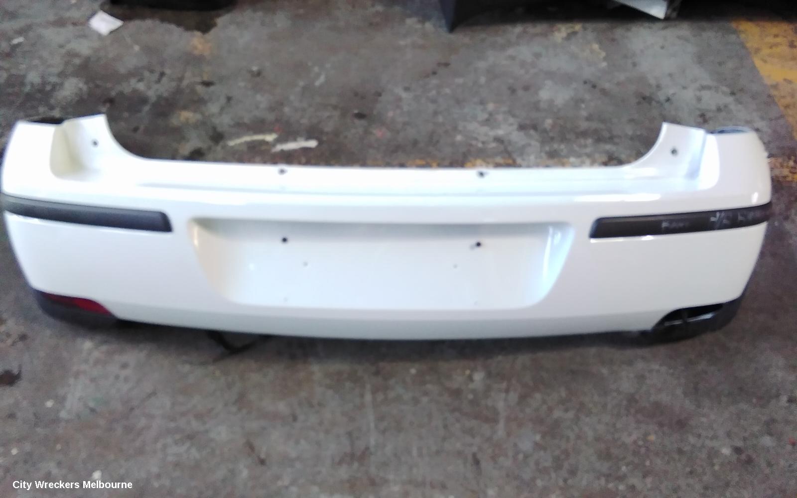 HOLDEN BARINA REAR BUMPER, BUMPER BAR, HATCH, LAST 8 DIGITS OF VIN IS FROM  44000001-, (REFLECTORS ON BOTTOM), XC, 03/2001 - 11/2005