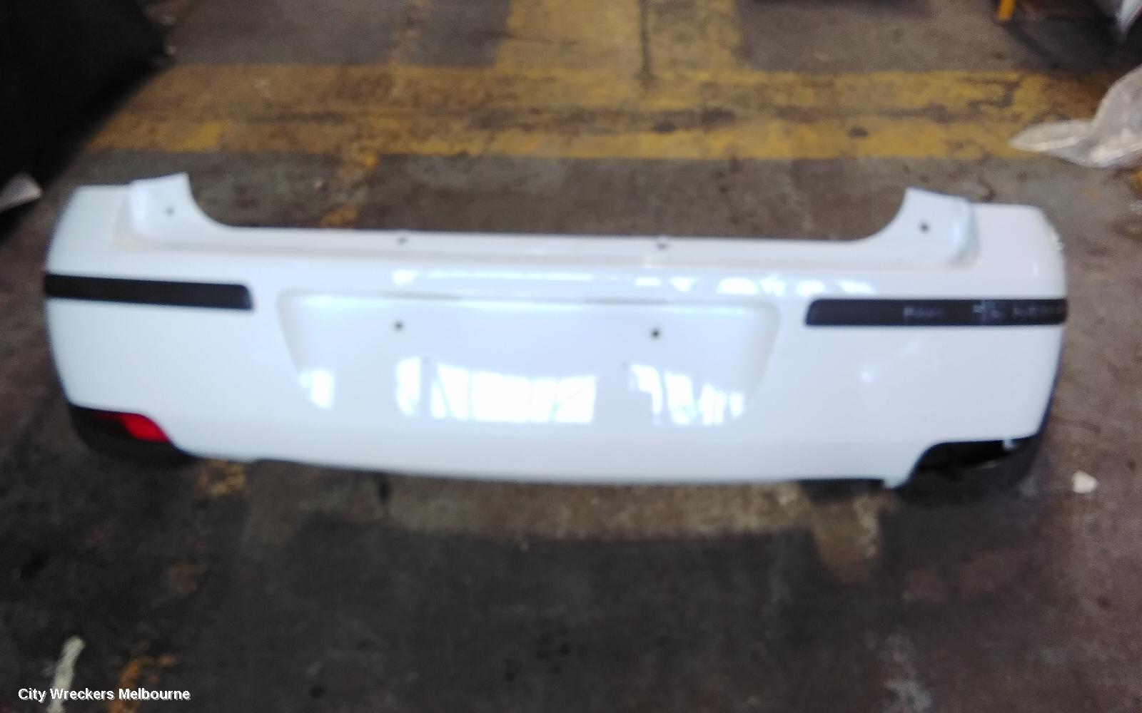 HOLDEN BARINA REAR BUMPER, BUMPER BAR, HATCH, LAST 8 DIGITS OF VIN IS FROM  44000001-, (REFLECTORS ON BOTTOM), XC, 03/2001 - 11/2005