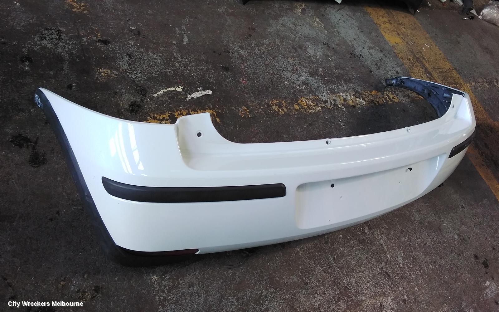 HOLDEN BARINA REAR BUMPER, BUMPER BAR, HATCH, LAST 8 DIGITS OF VIN IS FROM  44000001-, (REFLECTORS ON BOTTOM), XC, 03/2001 - 11/2005