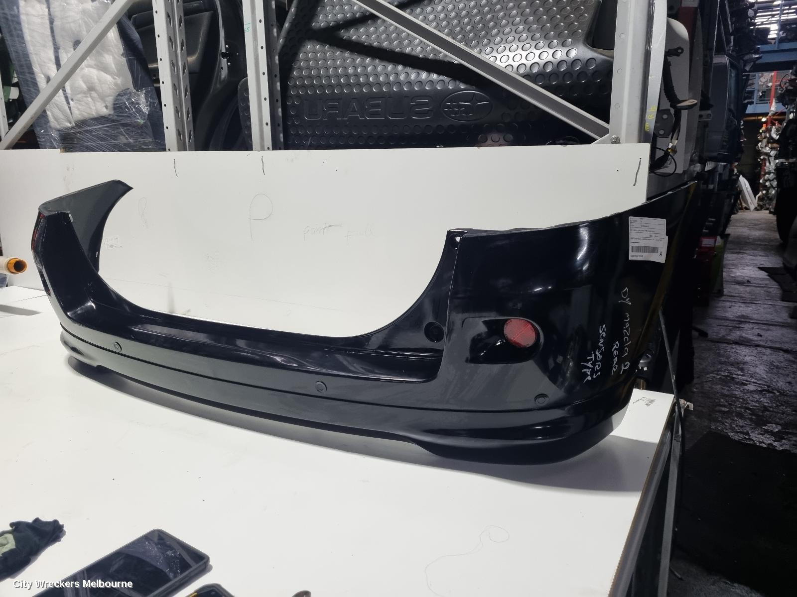 MAZDA 2 REAR BUMPER, DY2 SERIES, SPOILERED TYPE, 06/2005 - 09/2007