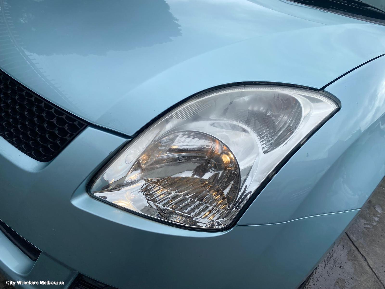 SUZUKI SWIFT LEFT HEADLAMP, RS415, MAN BEAM ADJUSTMENT, CHROME INSERT TYPE, 09/2004 - 02/2011