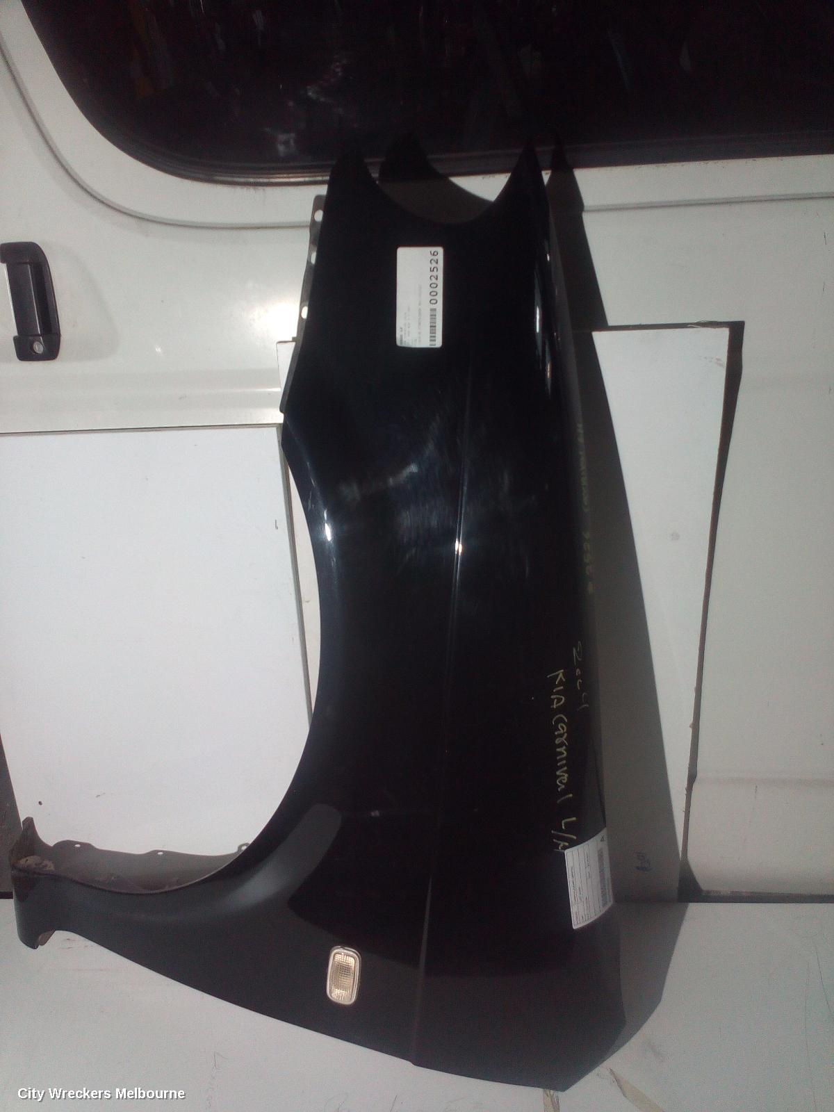 KIA CARNIVAL/GRAND CARNIVAL LEFT GUARD, KV SII, 12/2001 - 09/2006