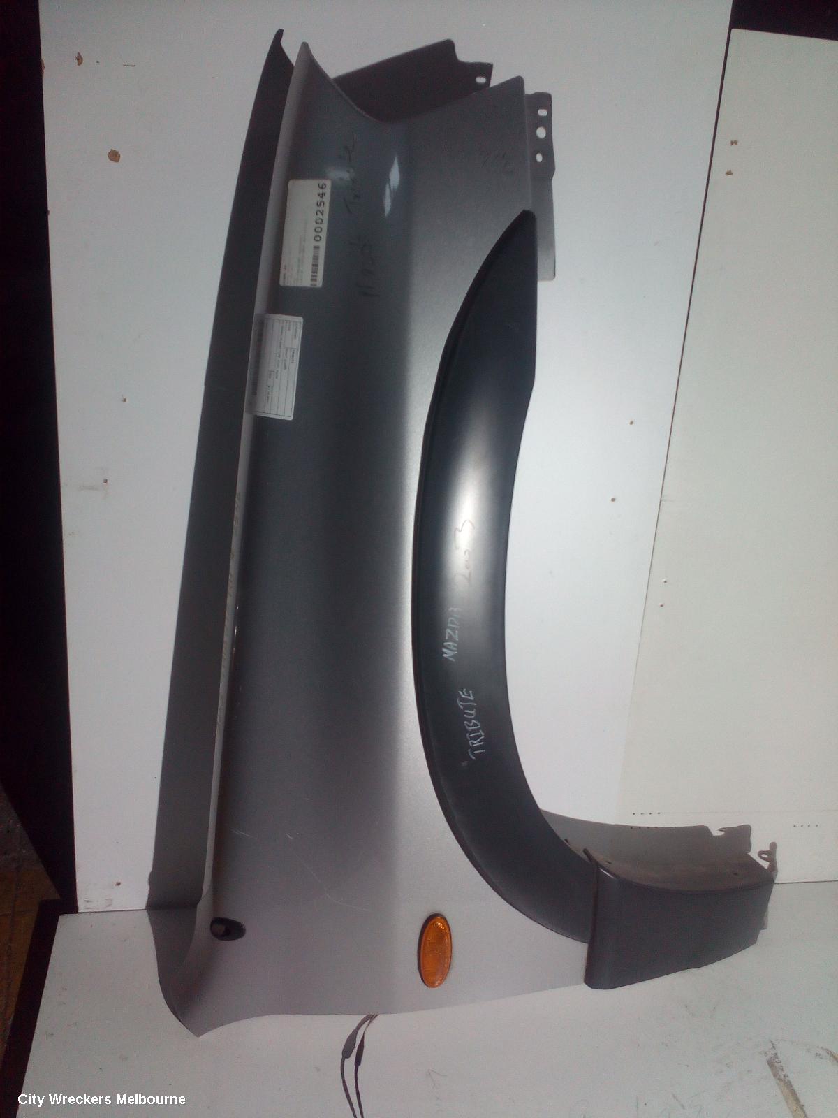 MAZDA TRIBUTE RIGHT GUARD, YU SERIES, FLARED TYPE, 02/2001 - 06/2006