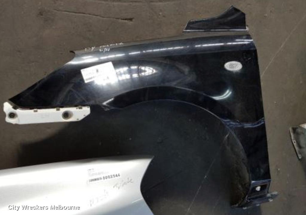 MAZDA 2 LEFT GUARD, DY SERIES, 12/2002 - 06/2005